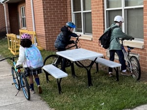 07- Students riding to school